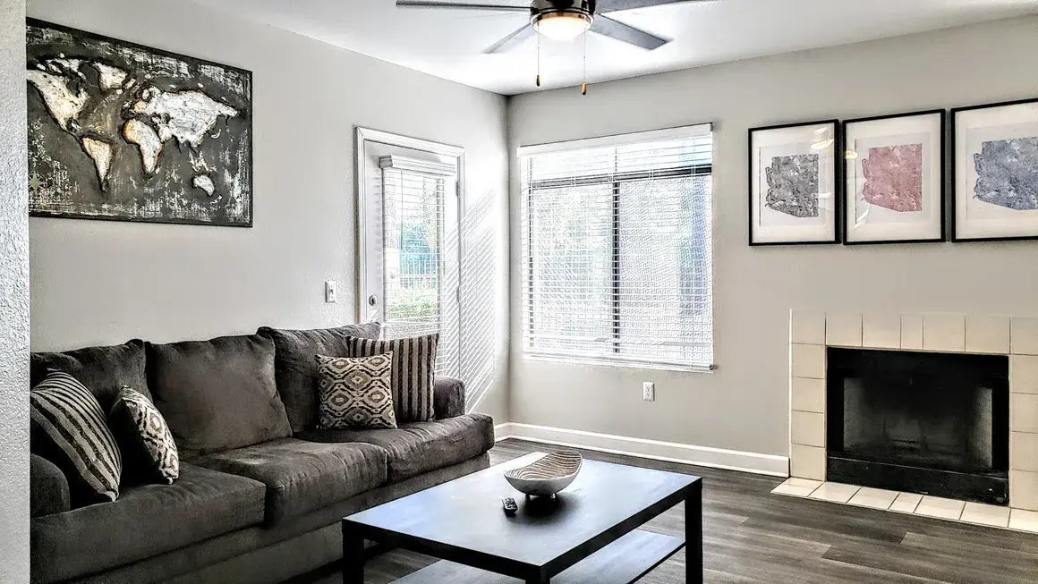 Bright furnished living room set up for an extended work assignment