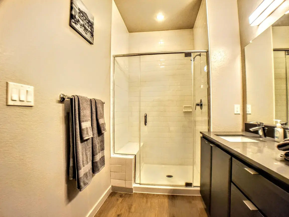 Clean bathroom with towels and essentials provided